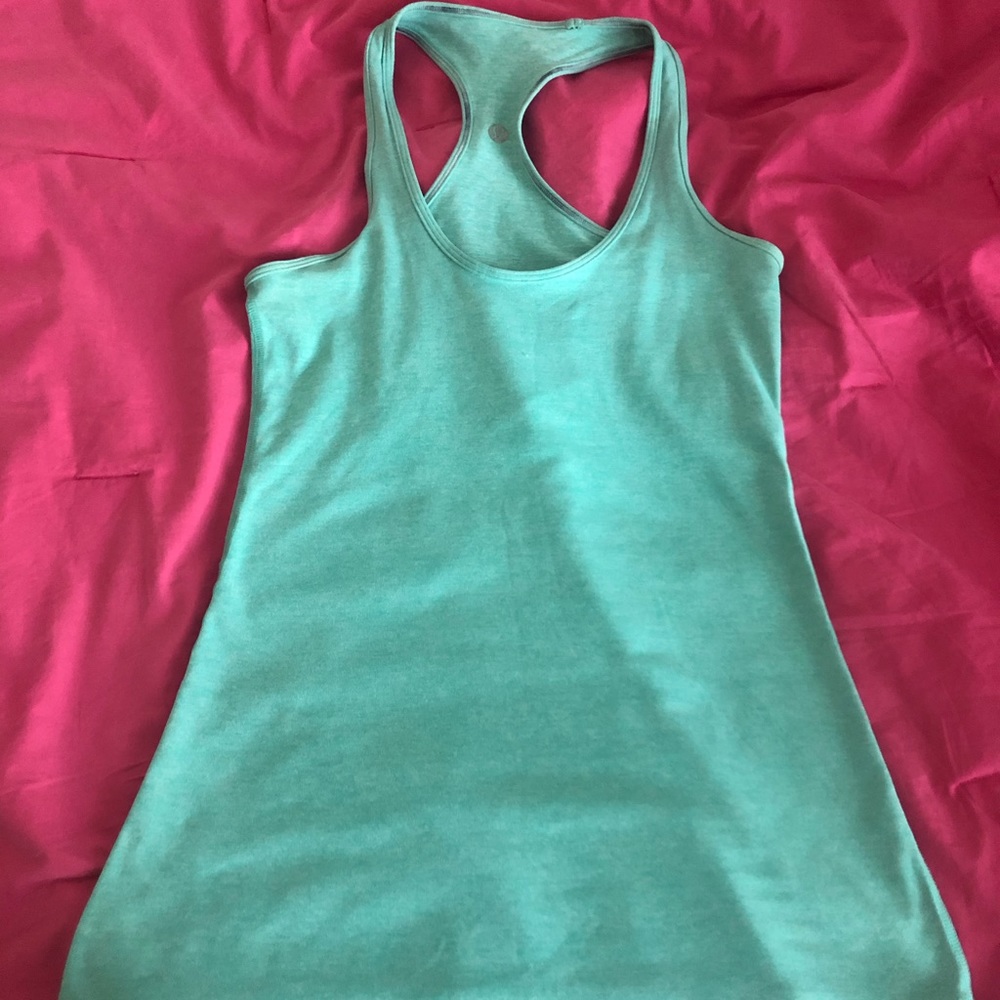 Aqua lululemon tank top.